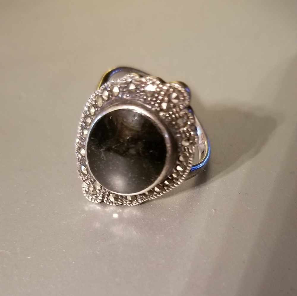 Black and silver ring